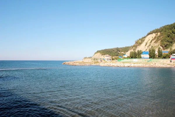 Güneş gökyüzünde ve kum plaj — Stok fotoğraf