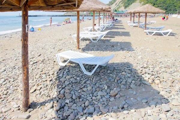 Sand on the solar beach — Stock Photo, Image