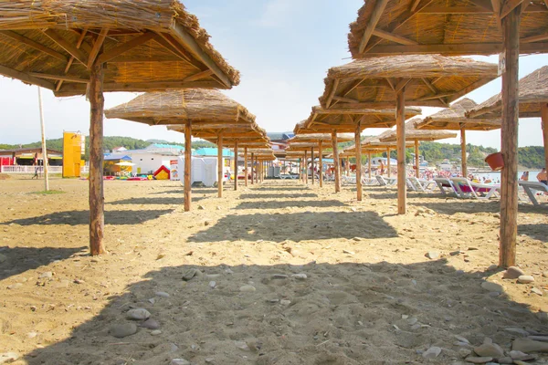 Sand on the solar beach — Stock Photo, Image