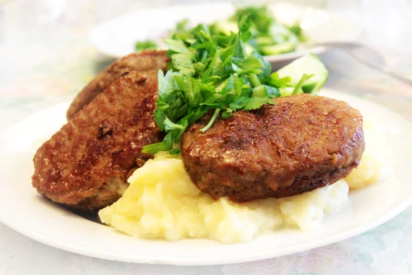 Chop and potatoes — Stock Photo, Image