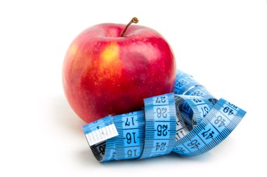 Kırmızı elma ve metre