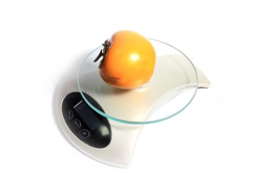 ağırlığında olan bir Trabzon hurması