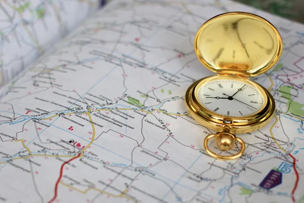 Old clock and geographical map — Stock Photo, Image