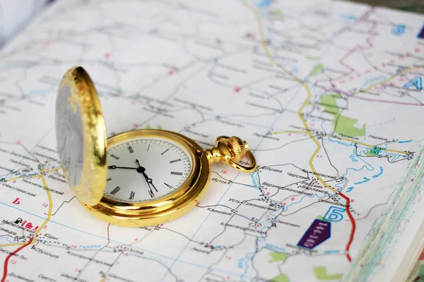 Old clock and geographical map — Stock Photo, Image