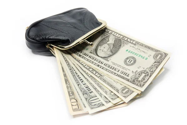 Dólares estão em uma bolsa preta — Fotografia de Stock