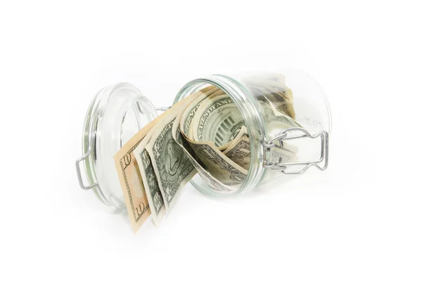 Dolarów w szklanym pojemniku — Zdjęcie stockowe