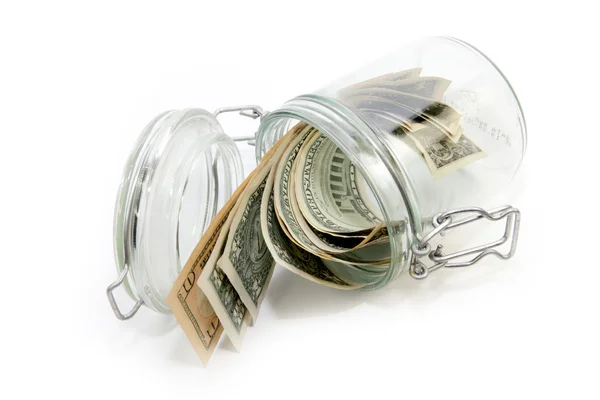 Dollars in a glass container — Stock Photo, Image