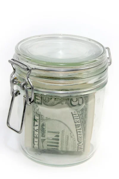 Dollars in a glass container — Stock Photo, Image