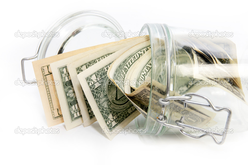 Dollars in a glass container