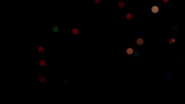 Noel süslerinin çok renkli lambalarının bulanık ışıkları