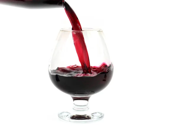 Bizarre Patronen Bij Het Gieten Van Rode Wijn Een Glas — Stockfoto