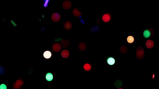 Manchas Embaçadas Luz Trabalhar Uma Grinalda Festiva Com Uma Lâmpada — Vídeo de Stock