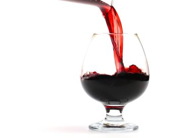 Kırmızı şarap bardağa döküldüğünde dalgalar yaratır.