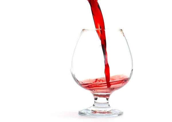Κόκκινο Κρασί Κάνει Κύματα Όταν Χύνεται Ένα Ποτήρι — Φωτογραφία Αρχείου