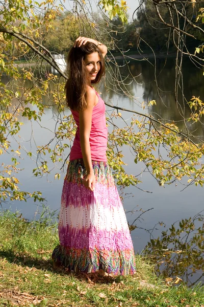 Beautiful girl in forest near pond — Stock Photo, Image