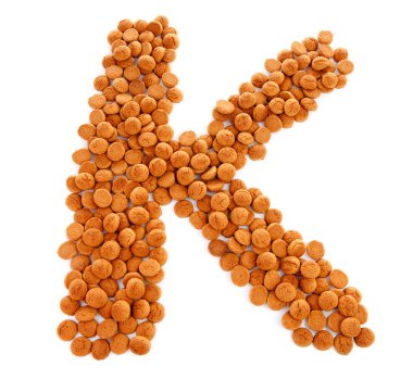 gember noten, pepernoten, in de vorm van de letter k