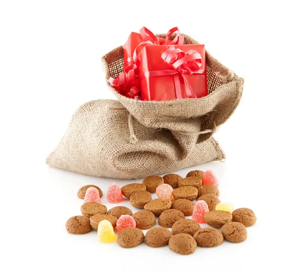 Typical Dutch celebration: Sinterklaas with surprises in bag and Stock Picture
