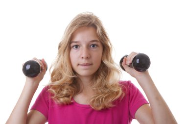 kız beyaz arka plan üzerinde dumbbells ile spor olduğunu
