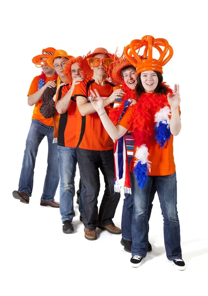 Group of Dutch soccer fans making polonaise over white backgroun Royalty Free Stock Photos