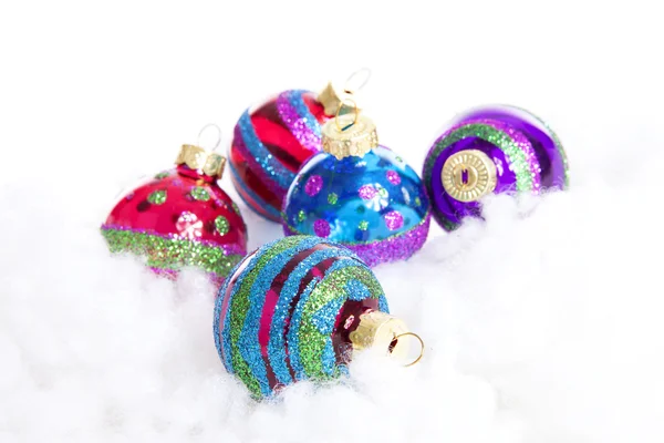 Colorful glitter Christmas balls over white background — Stock Photo, Image