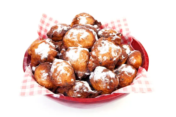 Skål med hög av nederländska donut kallas även oliebollen, traditio — Stockfoto