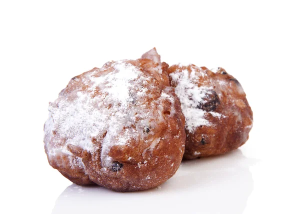 两个荷兰甜甜圈也被称为 oliebol，传统新年的电动汽车 — 图库照片