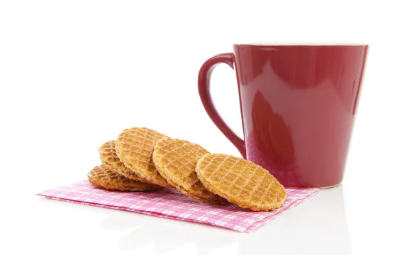 Hromadu typické holandské stroopwafels (s sirupem) na ubrousek poblíž — Stock fotografie