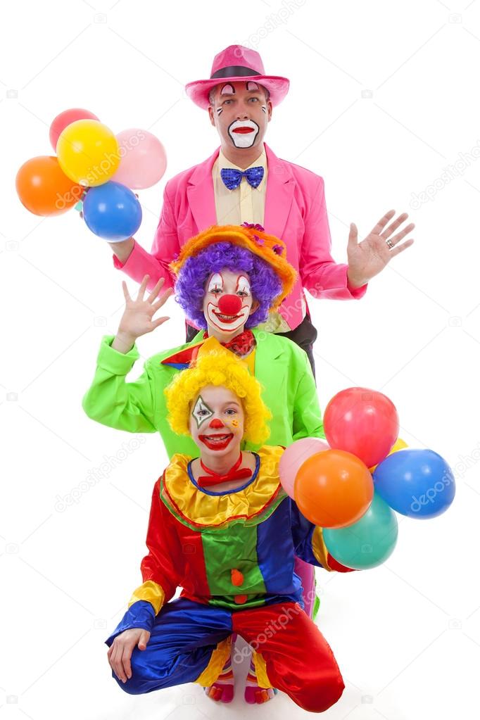 Three people dressed up as colorful funny clowns over white back Stock Photo by ©sannie32 43148647 Three people dressed up as colorful funny clowns over white back Stock Photo by ©sannie32 43148647