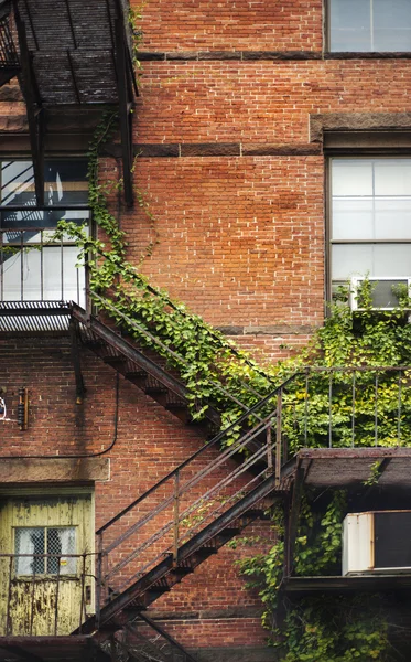 Fire escape brick facade — Stock Photo, Image