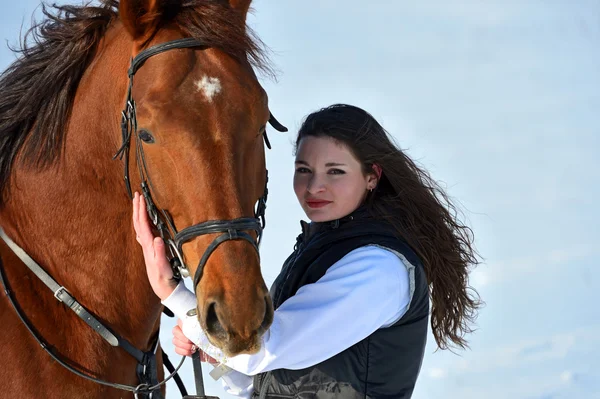 Menina com um cavalo — Fotografia de Stock