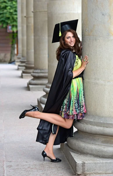 Un graduado universitario en túnicas — Foto de Stock