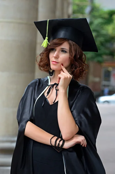 A university graduate in robes — Stock Photo, Image