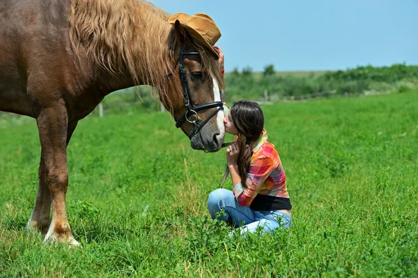 Girl with a horse — Stock Photo, Image