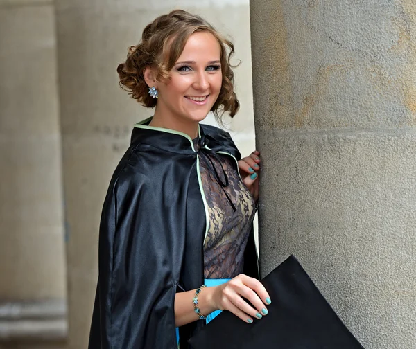 A university graduate in robes — Stock Photo, Image