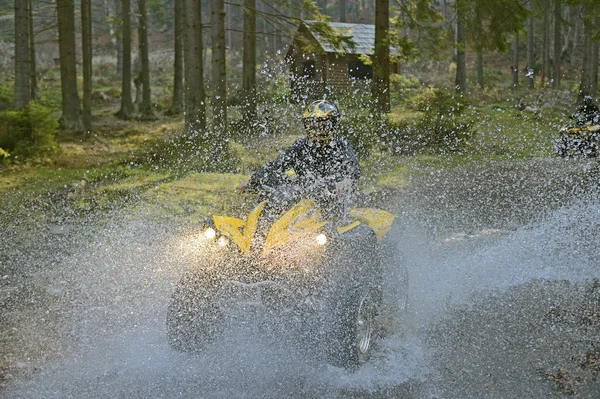 Travel through the mountains on ATVs — Stock Photo, Image