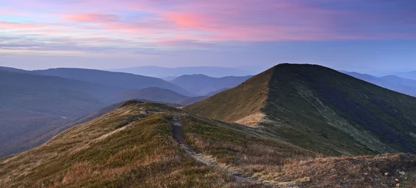 Hoskhod sun in the mountains — Stock Photo, Image