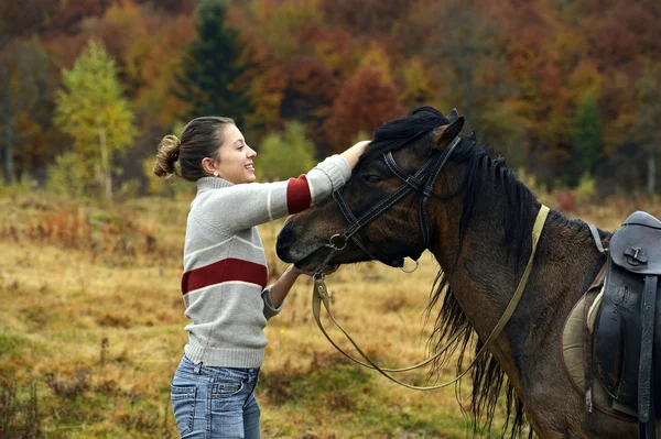 Horseback riding in the mountains — Stock Photo, Image