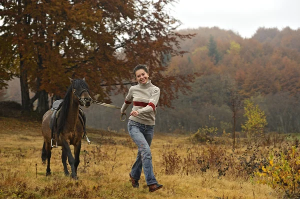 Horseback riding in the mountains — Stock Photo, Image