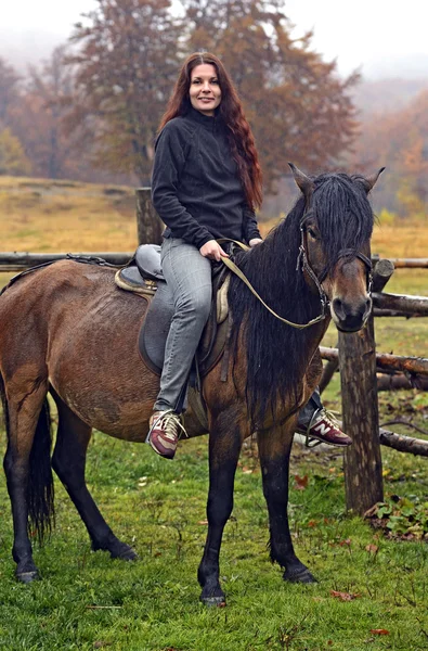 Horseback riding in the mountains — Stock Photo, Image