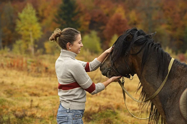 Horseback riding in the mountains — Stock Photo, Image