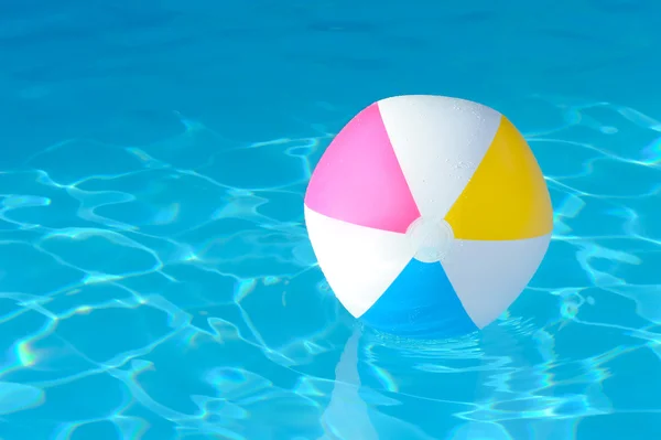 Inflatable ball in swimming pool — Stock Photo, Image