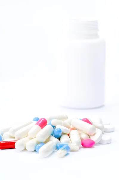 Pills from a prescription medicine bottle — Stock Photo, Image