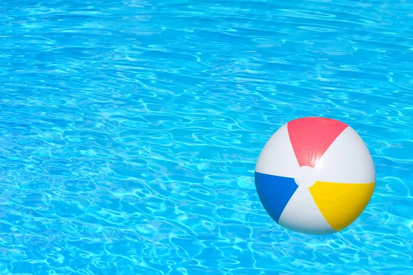 Inflatable ball in swimming pool — Stock Photo, Image