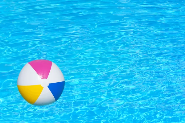 Inflatable ball in swimming pool — Stock Photo, Image