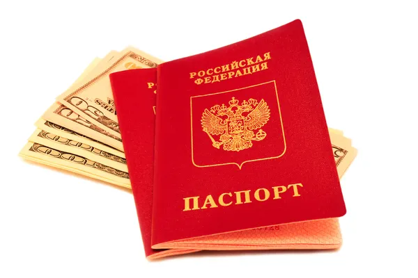ロシアのパスポートとアメリカの通貨 ストック写真