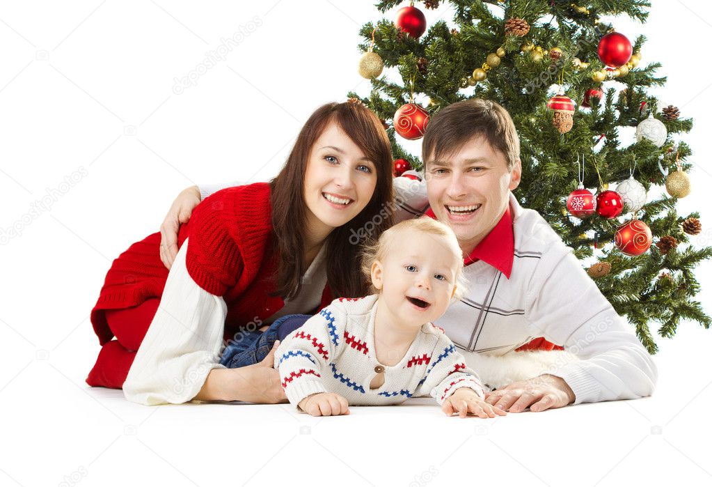 Christmas family of three persons and fir tree