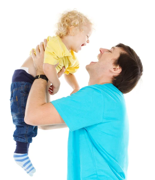 Glad pappa leker med barn som höjer honom upp — Stockfoto