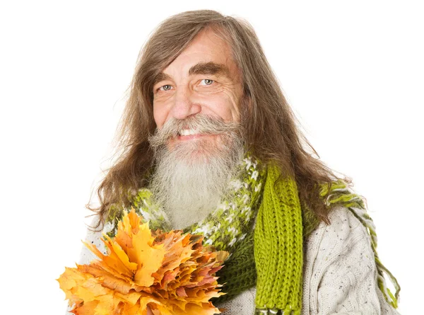 Senior old man with beard, long hairs and maple leaves — Stock Photo, Image