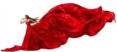 Uçan kumaş, ipek kumaştan sallayarak ve rüzgarla çırpınan Kırmızı elbiseli kadın