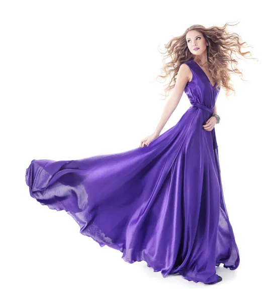 Woman in purple silk fluttering waving dress, Fashion Girl Turning on white background — Stok fotoğraf